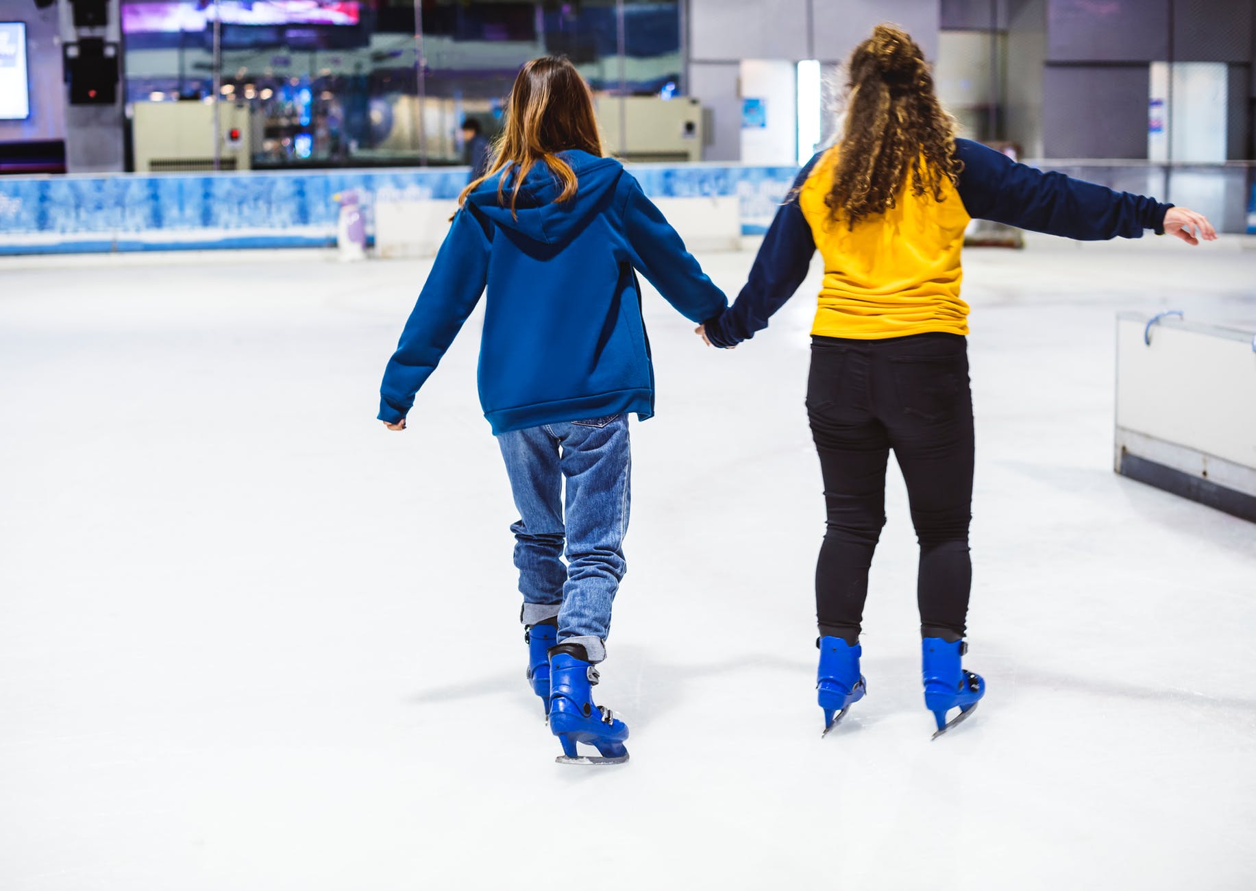 two girls ice skating